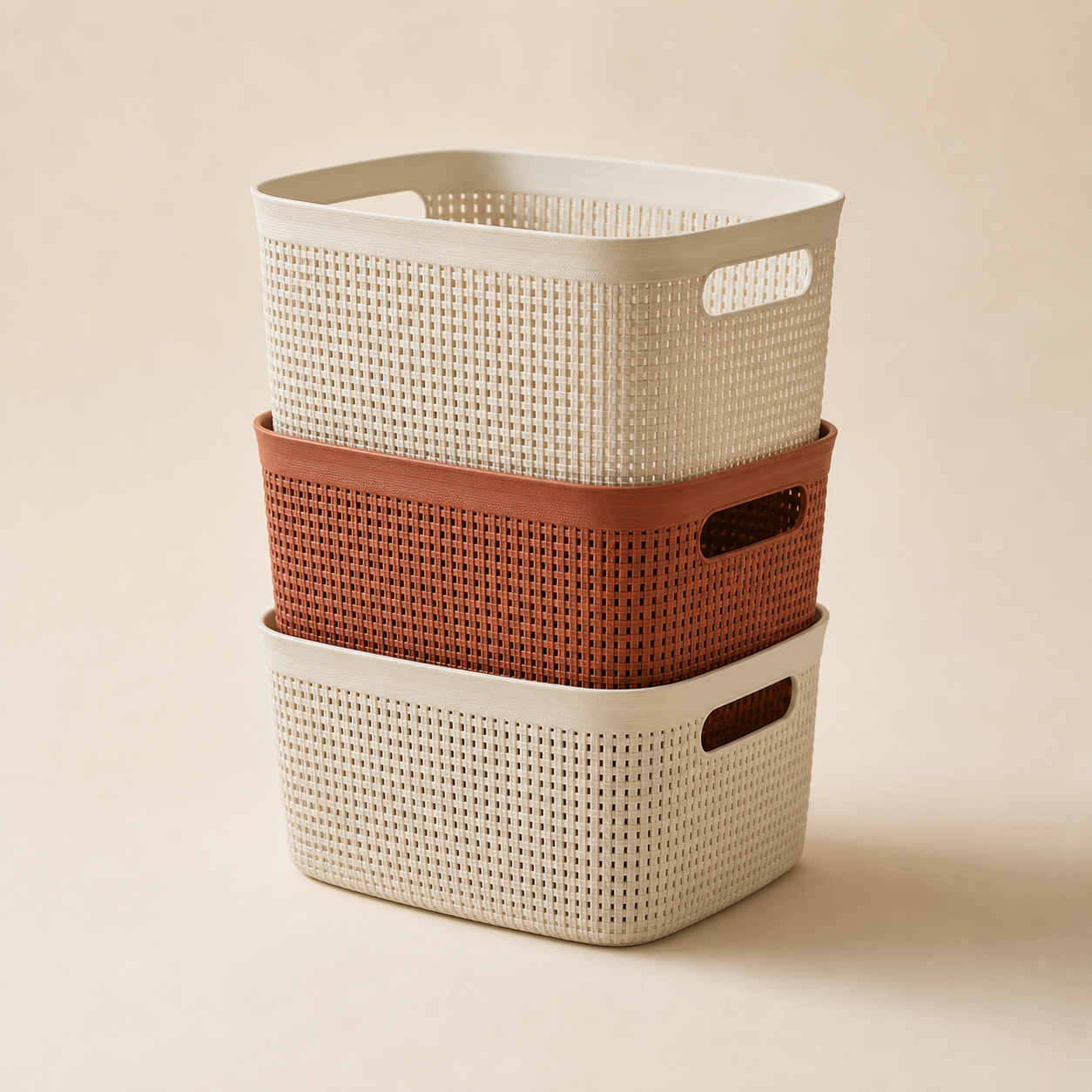 Stacked ivory and terracotta storage baskets